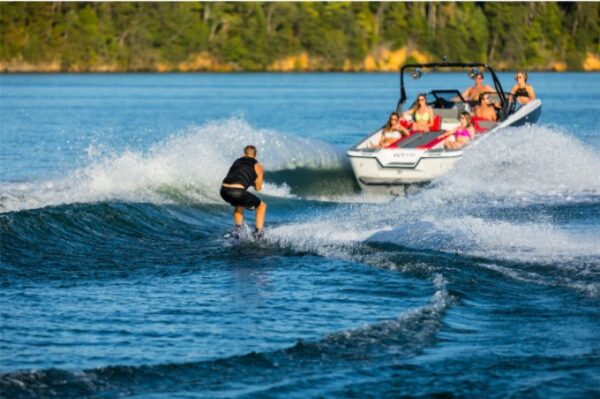 wakeboarding and a speedboat
