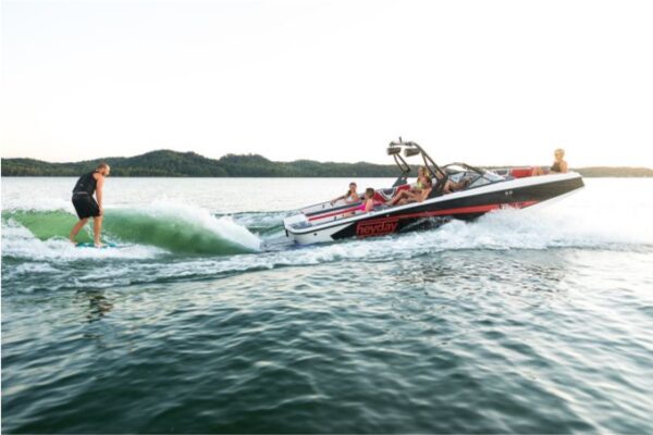 wakeboarding and a speedboat